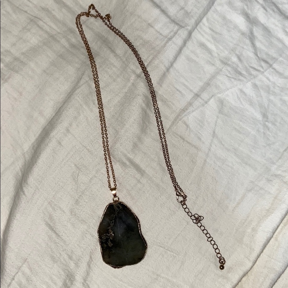Stone necklace.